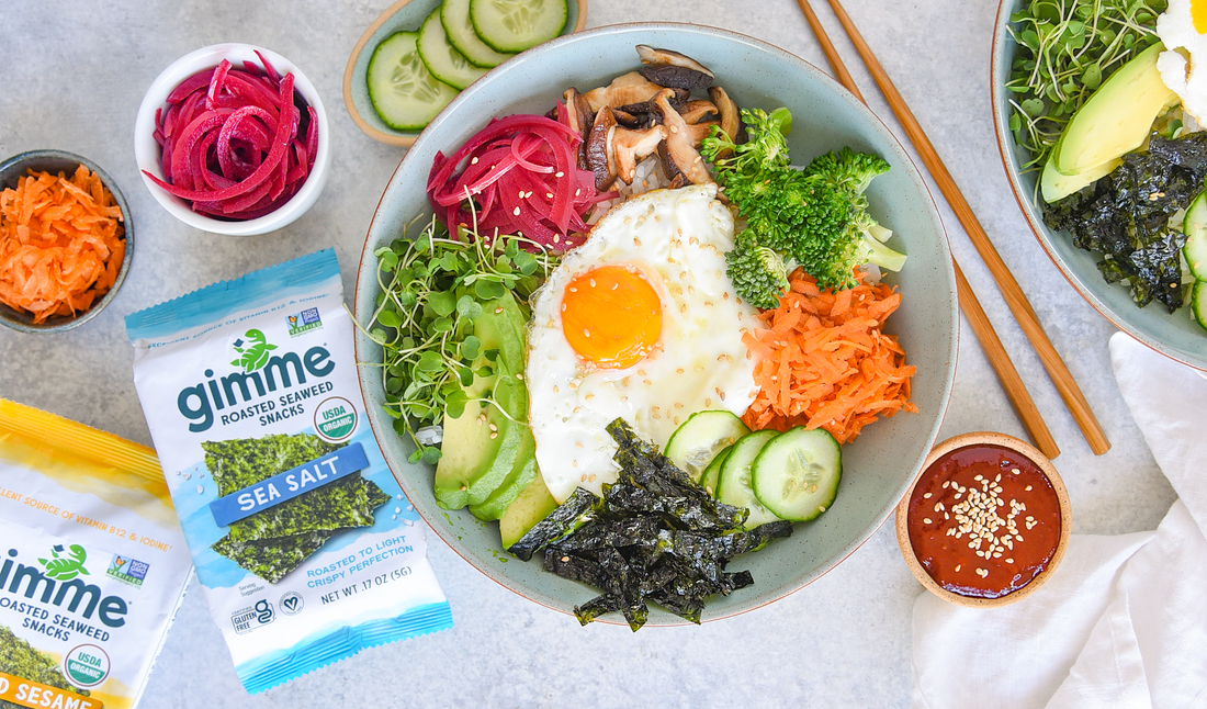 Bibimbap bowl with gimme sea salt seaweed snack.