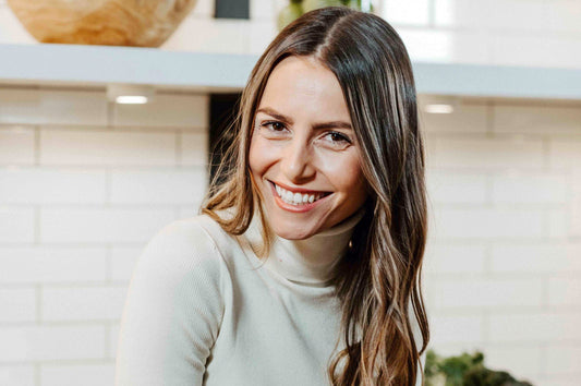 A picture of a woman smiling.