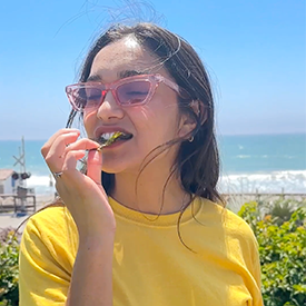 Person eating and enjoying gimme seaweed.