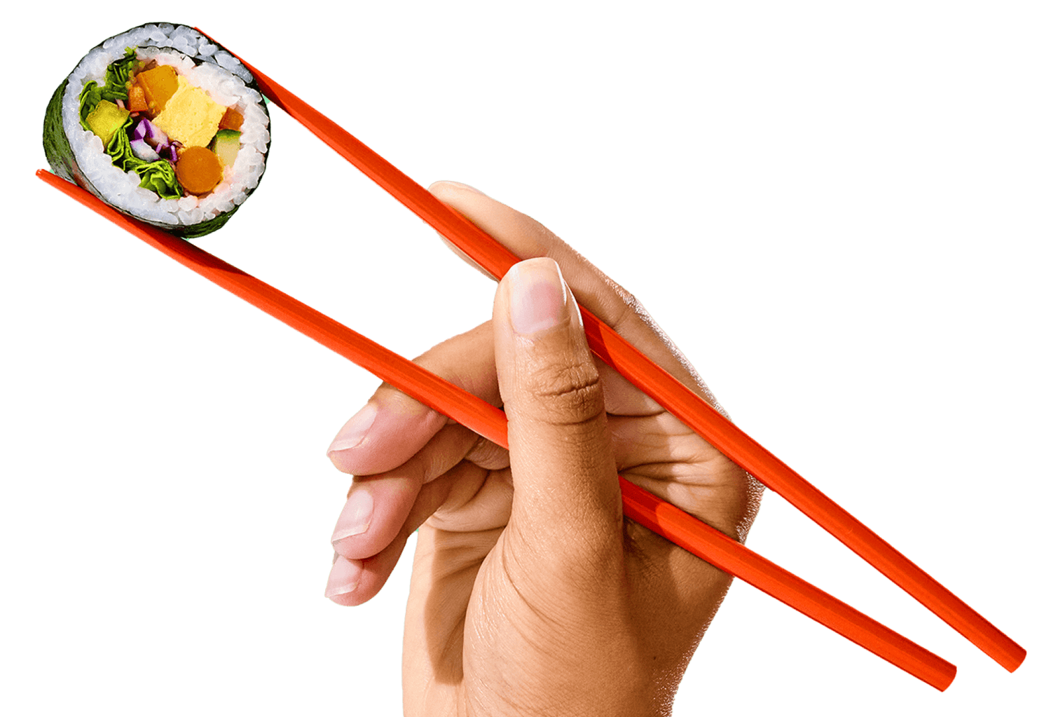 A hand holding orange chopsticks grasps a sushi roll filled with various ingredients.