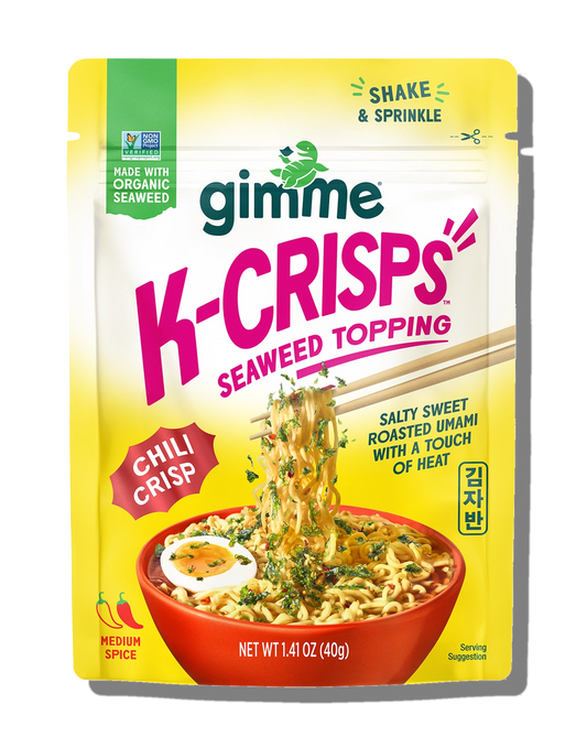 Packaging of gimme K-Crisps Seaweed Topping with a bowl of noodles and chopsticks on a yellow background.